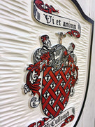 Close up of Mccullough Family Coat of Arms carved and painted