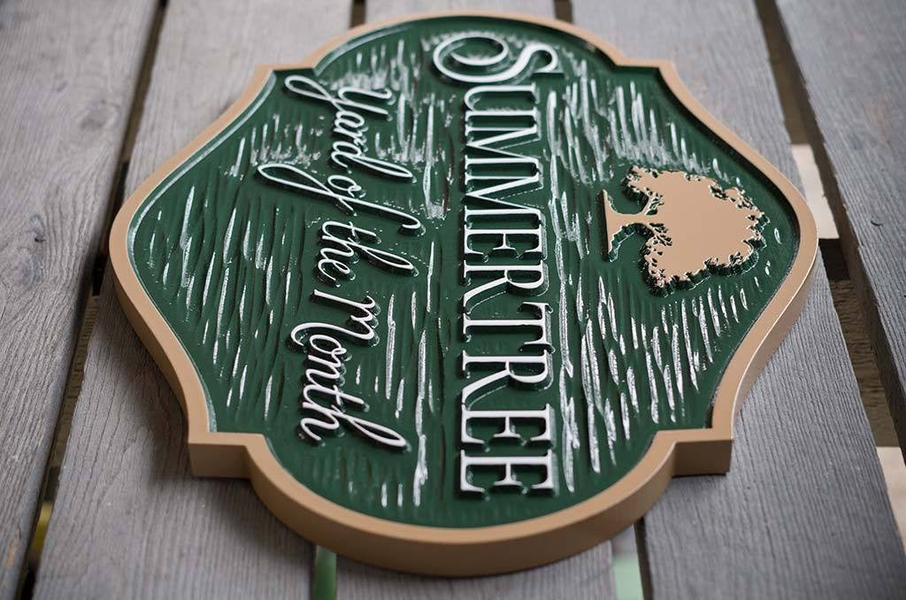 side view Yard of the month green and tan with tree sign horizontal shape for neighborhood
