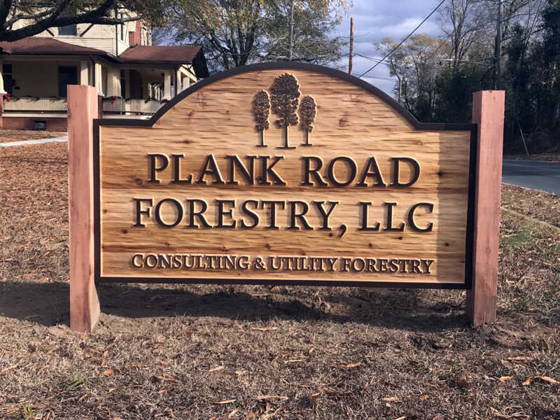 Plank Road Forestry wood carved sign