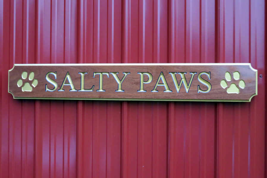 Mahogany quarterboard mounted on red barn